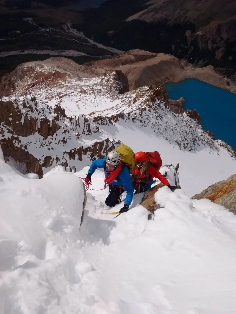A roped team in the snow, climbing Cerro Madsen