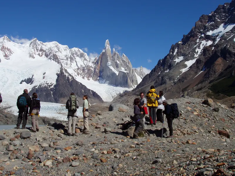 A group on the moraine, with Cerro Torre behind
